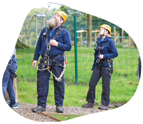 Group of people in climbing equipment